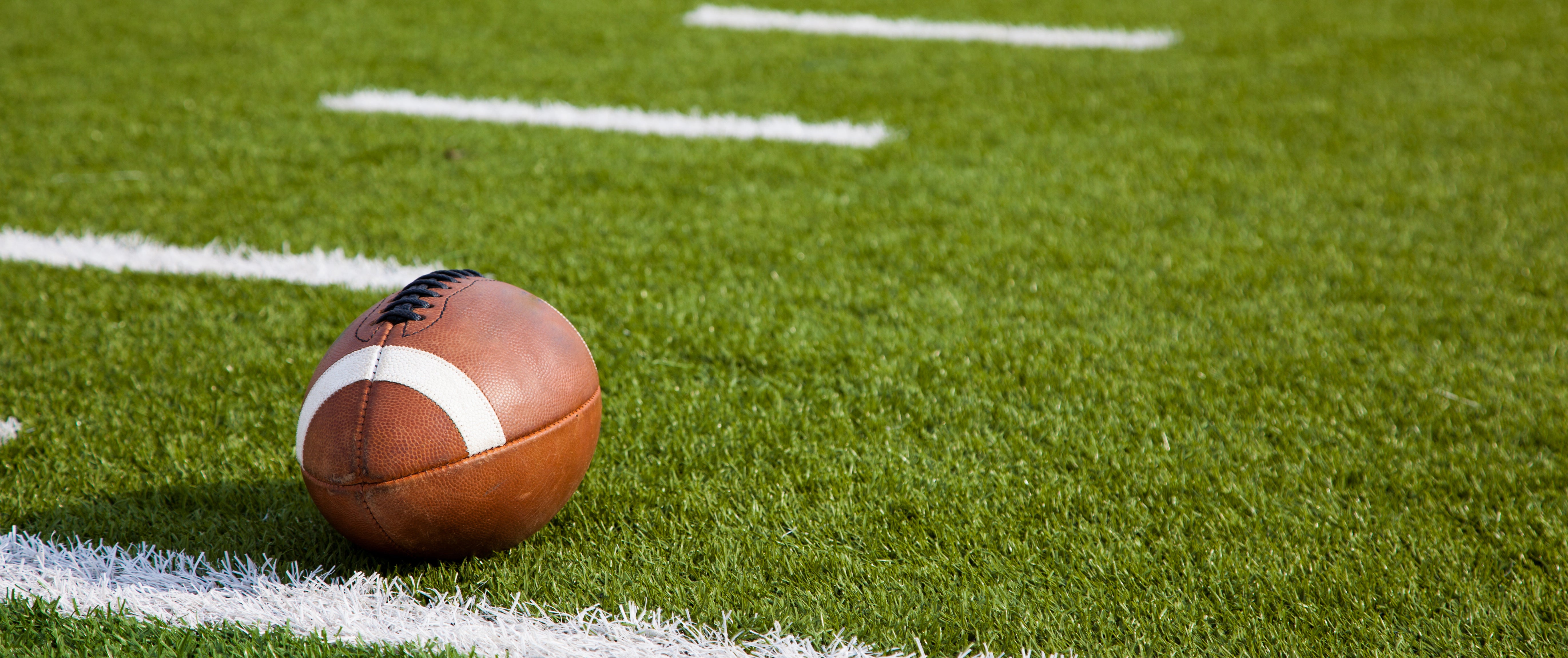 Football on artificial turf field
